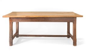 A FRENCH FARMHOUSE TABLE, 19TH CENTURY, the thick plane tree top on an oak and chestnut base, with a