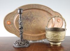 A Chinese bronze candlestick, a similar bronze vessel and a copper tray, late 19th / early 20th