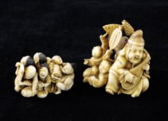 Two Japanese ivory netsuke, Meiji period, the first carved as a group of drunken men, two