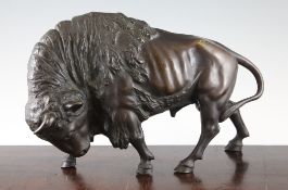 A 20th century patinated bronze model of a buffalo, unsigned, 14.5in.