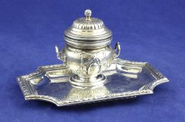 A late 19th/early 20th century French 950 standard silver inkstand, of shaped rectangular form
