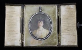 Miss Lucy Mary Crisp (fl.1908-1911)oil on ivory,Miniature of a lady wearing a pearl necklace,