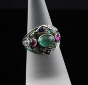 An early 20th century Arts & Crafts silver and enamel, multi cabochon gem cluster dress ring,