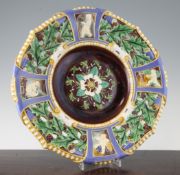 A Minton majolica dish, second half 19th century, the centre moulded with a white rose and