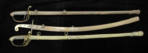 A 19th century Mameluke sword, with ivory handle and steel scabbard, the blade feintly marked