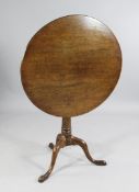A George III mahogany circular tripod table, W.2ft 5.5in.