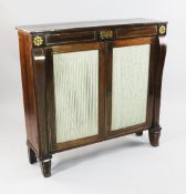 A Regency brass inlaid rosewood chiffonier, fitted two doors with pleated silk panels and shaped