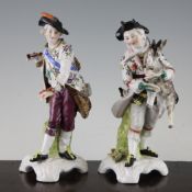 A pair Volkstedt porcelain figures, late 19th century, modelled as man holding a goat and another