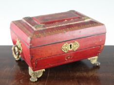 An early 19th century gilt tooled and red leather bound work box, with gilt brass mounts, handles