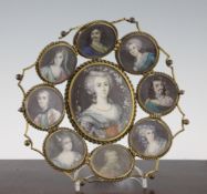 A Victorian gilt brass openwork basket, with central oval painted miniature of a lady surrounded