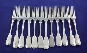 Two sets of six 19th century silver fiddle pattern table forks, with engraved monogram and