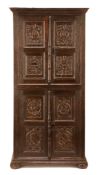 A PANELLED OAK CUPBOARD, LATE 16TH CENTURY, the moulded cornice above two pairs of quadruple
