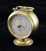 A Victorian gilt brass Negretti & Zambra double sided desk barometer, with opposing thermometer