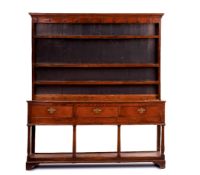 A GEORGE III OAK DRESSER, SOUTH-WEST WALES, LATE 18TH CENTURY, the rack with a moulded cornice above