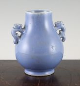 A Chinese blue glazed pear shaped two handled vase, Hu, Yongzheng mark but later, 6in. (15.2cm)