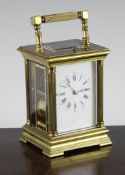 A late 19th century French eight day hour repeating carriage clock with enamel dial and movement