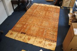 A large Fijian tapa cloth, block printed allover with geometric and floral motifs, 13ft .5in. x