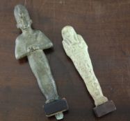 An Egyptian pottery ushabti, with olive green glaze, 5in., together with a similar bronze Egyptian