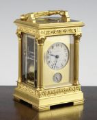 An Edwardian petit sonnerie alarum carriage clock, with circular silvered arabic dial signed Leroy &