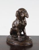 After Alfred Jacquemart (1824-1896). A 19th century bronze miniature model of a seated bloodhound,