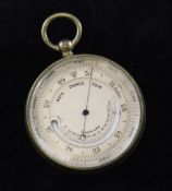 A late Victorian gilt brass pocket barometer and thermometer, with silvered dial and red morocco