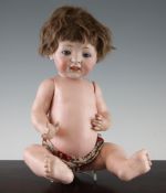 A J.D. Kestner bisque headed doll, impressed marks and number 211 to back of head, with sleeping