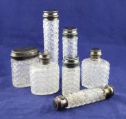 A Victorian silver mounted cut glass seven piece toilet set, comprising six jars/bottles and a