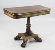 An early 19th century mahogany folding tea table, with stiff leaf carved column, rosewood