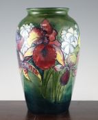 A large Walter Moorcroft Orchid pattern ovoid vase, with green graduated ground, impressed mark,