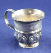 A Queen Anne provincial silver cup, with reeded handle, banded girdle and demi fluted filleted