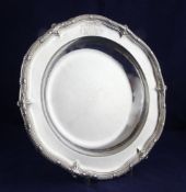 A George II silver serving dish, of shaped circular form, with reeded and shell rim and engraved