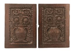 A PAIR OF CONTINENTAL CARVED OAK DOORS, LATE 16TH / EARLY 17TH CENTURY, the boldly carved panels