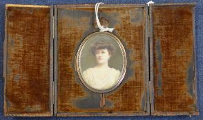 Miss Lucy Mary Crisp (fl.1908-1911)oil on ivory,Miniature of a young lady,signed,2.75 x 2.25in.; 9ct