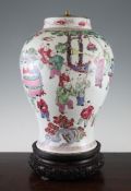 A Chinese famille rose `Hundred Boys` baluster vase, 19th century, painted with a procession of boys