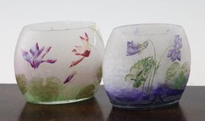 Two Daum cameo etched `pillow` vases, c.1900, the first decorated with violets and sinuous leaves