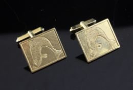A pair of 18ct gold cufflinks, engraved with leaping salmon, of rectangular form, 15.8 grams.