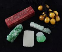 Three Chinese jadeite carvings, a jade plaque and a soapstone seal, the jadeite carvings in the form