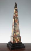 A large 19th century specimen marble obelisk, on square stepped base, 22.75in.