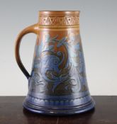 A C.H. Brannam, Barum pottery ewer, dated 1890, of tapering cylindrical form, decorated with