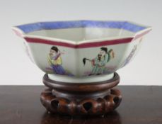 A Chinese famille rose octagonal dish, mid 19th century, the exterior painted with the eight