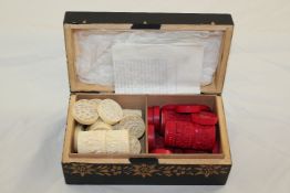A set of Chinese export ivory draughts, counters and dice cups, 19th century, one side natural,