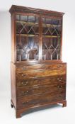 A George III mahogany secretaire bookcase, fitted a pair of astragal glazed doors over a