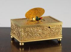 A late 20th century MMM symphonion singing bird music box, gold plated with acanthus leaf