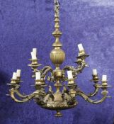 A large 20th century bronze chandelier, with central knopped column, gadrooned circular base and