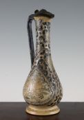 An early Martin Brothers stoneware ewer, c.1874, the pear shaped body incised with a nightjar in