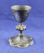 A George V silver and cabochon gem set chalice, with gem set knopped stem, on cusped foot with