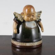 A Royal Doulton Stoneware novelty inkwell, modelled as a baby, c.1908, of bell form, impressed marks