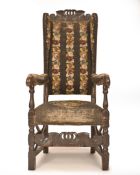 A CHARLES II OAK HIGH BACK ARMCHAIR, LATE 17TH CENTURY WITH LATER UPHOLSTERY, the slatted back