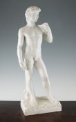 After Michelangelo. A polished white marble figure of David, on a rectangular base, signed Professor