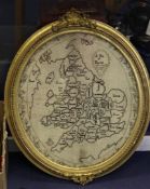 A late 18th century gilt framed oval needlework panel depicting a map of England, stitched with P.